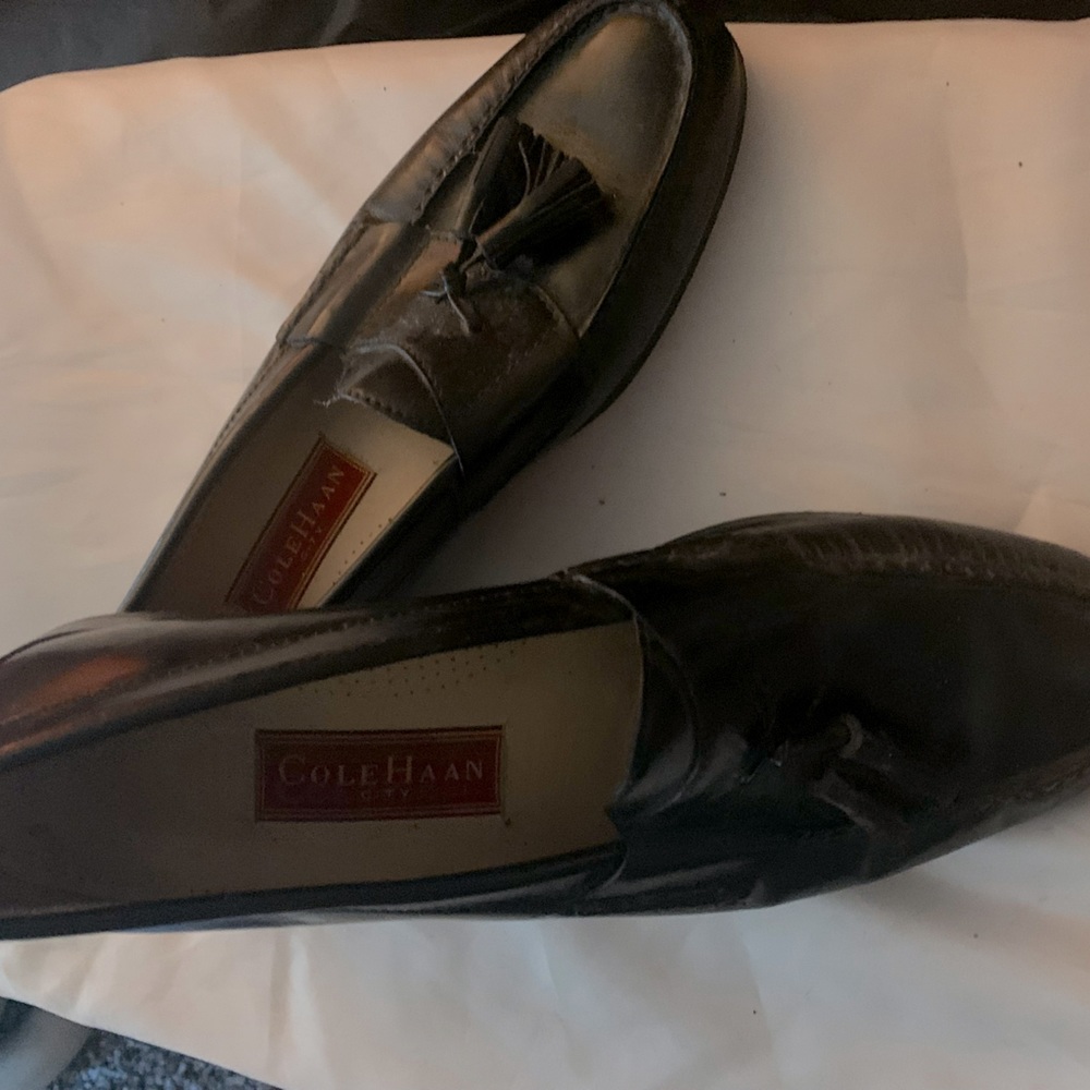 Black Cole Haan tassel leather loafers